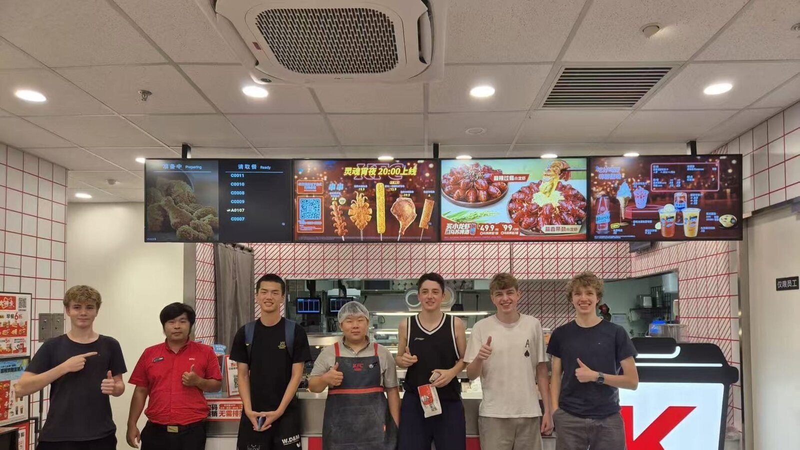 Gruppe mit dem KFC-Manager